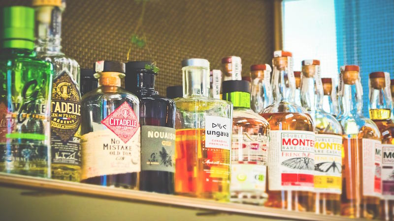 liquor shelf full of bottles