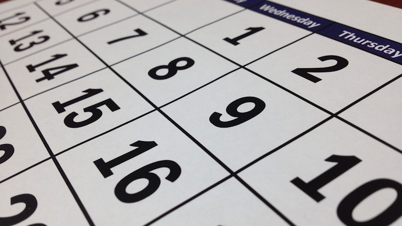 A zoomed in picture of a paper calendar.