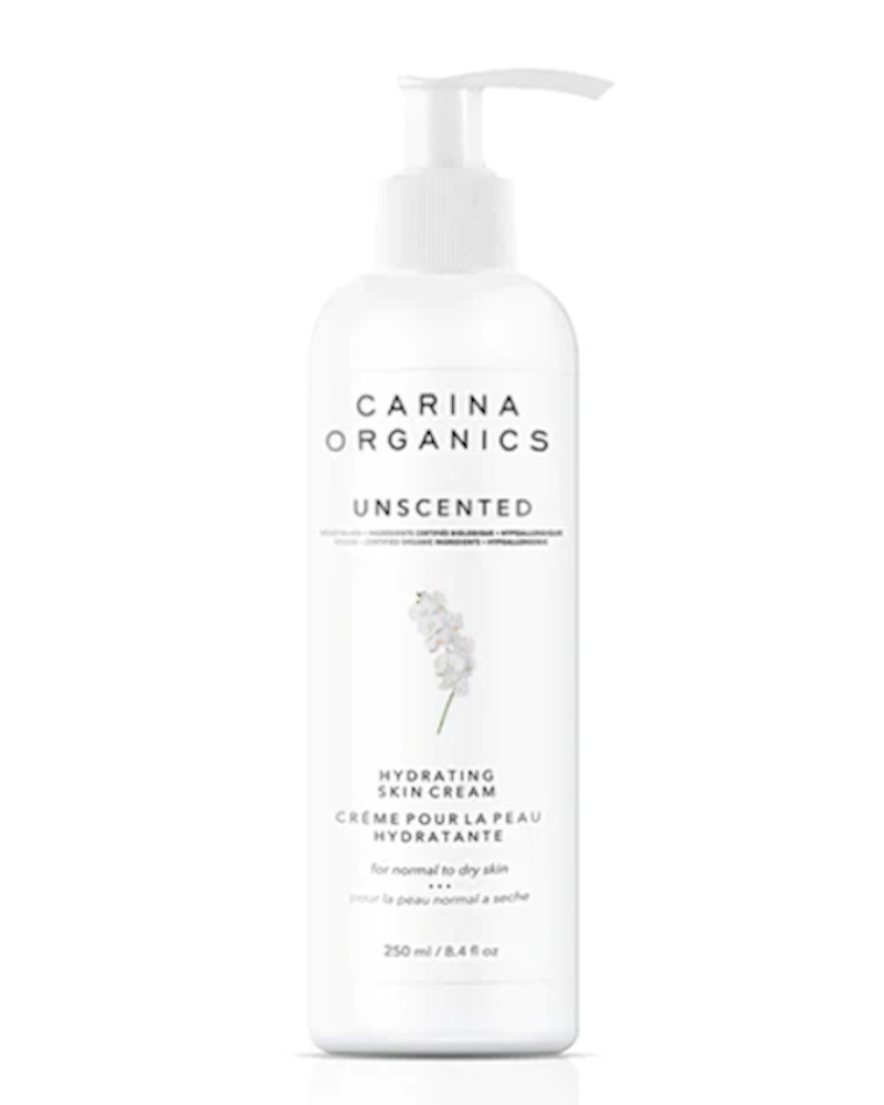 A white pump bottle of Carina Organics unscented hydrating skin cream.