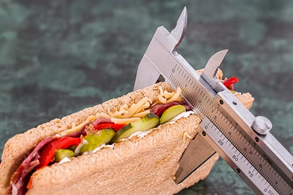 A sandwich being measured for its thickness, signifying a diet where you would need to measure your food.