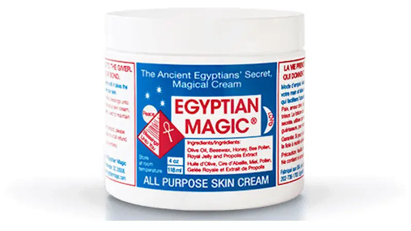 Egyptian Magic® skin cream in a white and blue plastic jar.