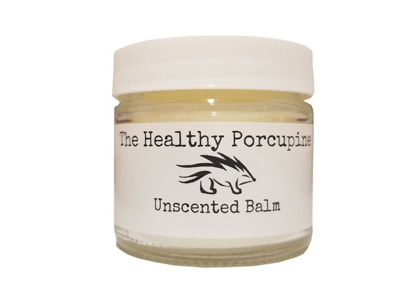A jar of The Healthy Porcupine® unscented balm for skin conditions such as eczema and dermatitis. This balm is made from bovine tallow.