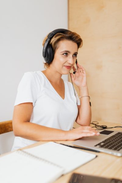 A woman on the phone providing customer service.