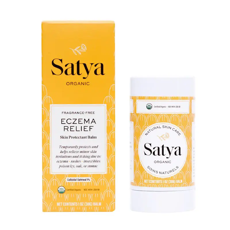 A box and roll on stick of Satya Organic Eczema Relief and Skin Protectant Balm. This balm protects the skin and relieves skin irritations, and itching.