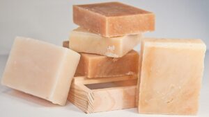 A collection of handmade bars of soap being displayed.