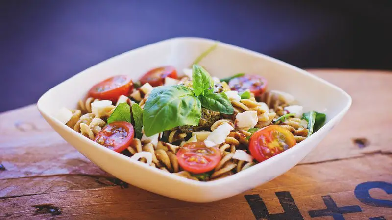 pasta dish with basil and tomatoes