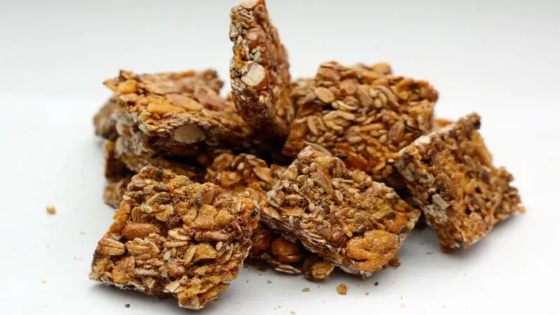 a pile of granola bars containing multiple grains